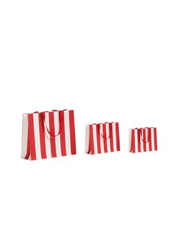 buste in carta lusso stripes rosso bianco con maniglie in grosgrain rosse