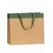 shopper in carta lusso colore avana con striscia colore verde e maniglia in grosgrain verde
