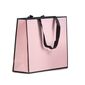 shopper in carta rosa con bordatura nera e maniglia nera in grosgrain