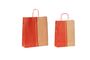 shopper in carta bicolore avana e rosso a fantasia micropois con maniglia intrecciata
